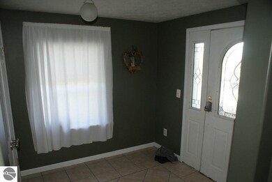 The foyer entrance adds beauty and functionality t