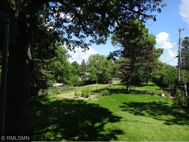 This large fenced yard has lots of room for a gard