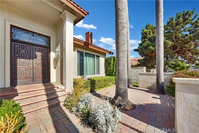 Lovely Front Courtyard abd Double Door Entry