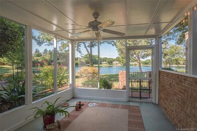 Spacious screen porch with tranquil views