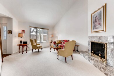 Vaulted Ceilings, and marble fireplace