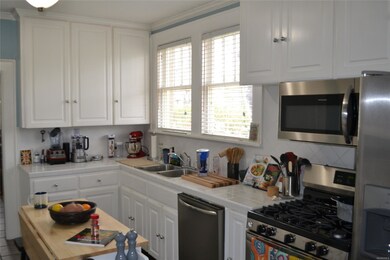 Step through the breakfast nook into the kitchen. 
