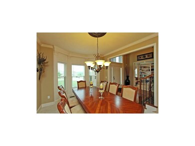 Large Formal Dining Rm with Bay Window & Mouldings
