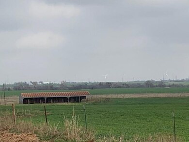 View of yard with a rural view