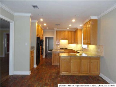 There are brick floors in the large breakfast room