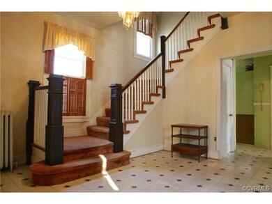 View of stairs from foyer.