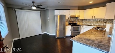 Kitchen with stainless steel appliances, under cab