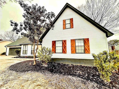 View of home's exterior with a garage