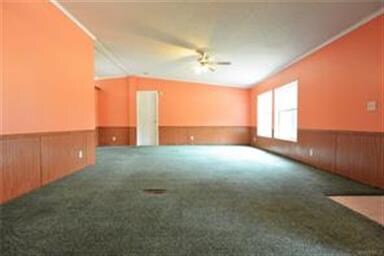 WOOD WAINSCOTING ADDS A NICE ACCENT TO THE SPACE.