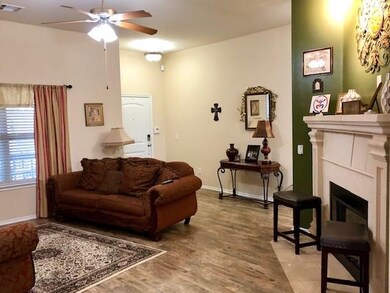 Living Area with beautiful corner Fireplace!