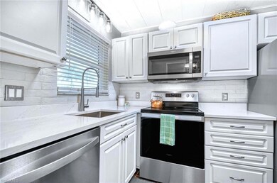 Kitchen featuring appliances with stainless steel 