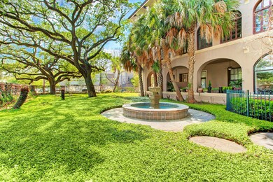 Serene terrace with waterfall, mature oak trees, a