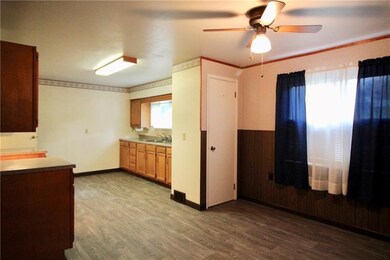 Another view of the spacious kitchen and dining ar