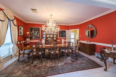 Formal dining room is so elegant and spacious. Cha