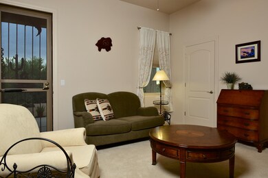 Second guest bedroom with private patio.