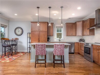 An expansive chef's kitchen with space for friends