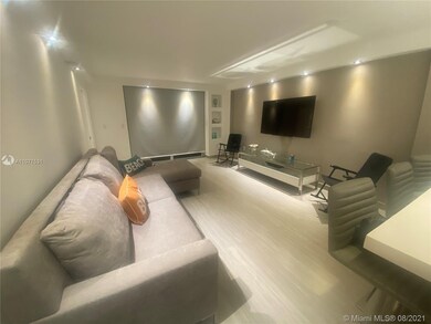 Living/ Dining area with decorative nitches off ba