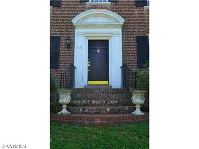 Exterior Front - Brick steps and arch door surroun