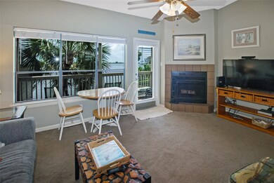 This cozy living space features a fireplace and di