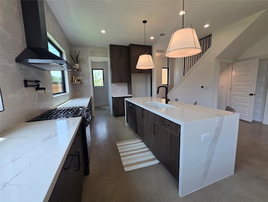 Kitchen with wall chimney exhaust hood, concrete 