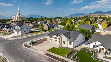 Aerial view of residential area featuring a mountain backdrop