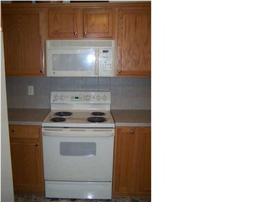 Kitchen...Range/Oven, Refrigerator, Microwave and 