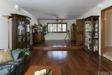 Elegant hardwood floors, smooth ceiling, crown mol