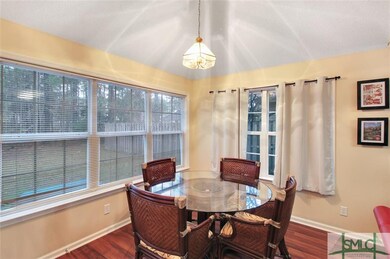 Eat in kitchen area over looking wooded back yard.