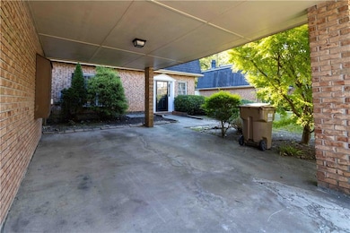 View of patio / terrace featuring an attached carp