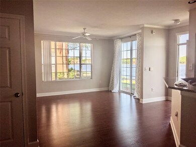 Open living room with floor to ceiling sliding doo