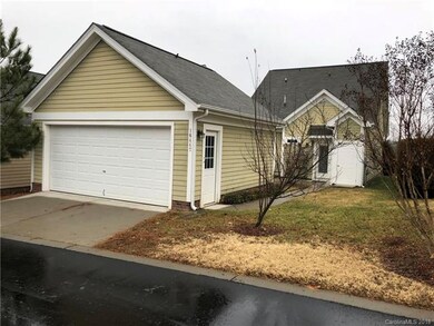 Detached two car garage at rear of home