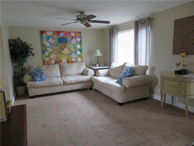 Large picture window and ceiling fan with newer ca