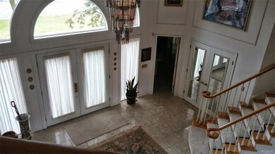 Spectacular 20 x 20 foyer with marble floors