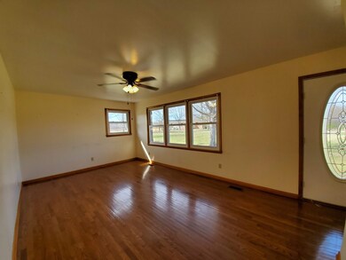 The hardwood floors are shining and well taken care of.  The Living Room can seat all your guests.