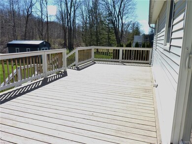 This deck is right off the kitchen and RUNS the en