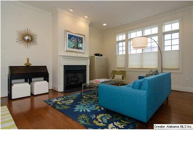 Beautiful living room with lots of windows and fir