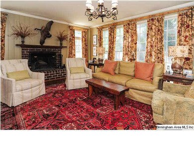 Spacious den with doors out to wrap around deck