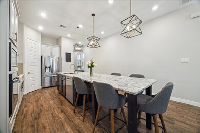 The gigantic kitchen island offers ample seating m