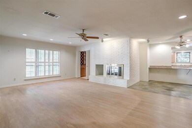 Unfurnished living room with light wood-type floor