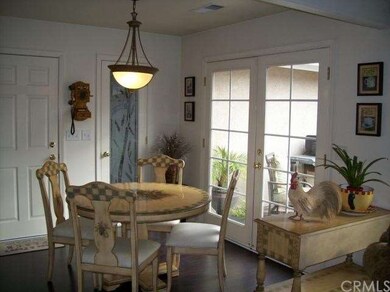 Breakfast nook with french doors to cobblestone pa
