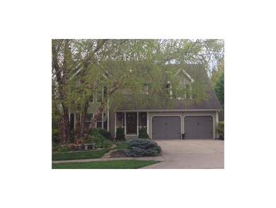 Front of home is beautifully landscaped as well.