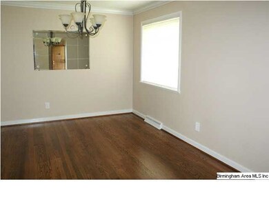 Formal diing room between the living room and kitc