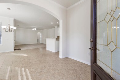 The Monaco floor plan features a welcoming entry with high ceilings, and easy care neutral tile flooring throughout the main living areas.