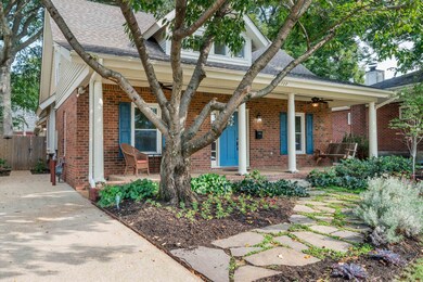 Bungalow featuring ceiling fan and covered porch