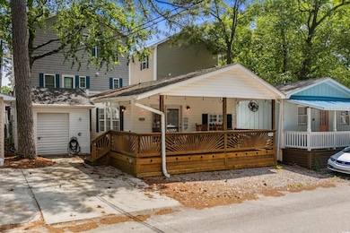 View of front facade featuring covered porch and a