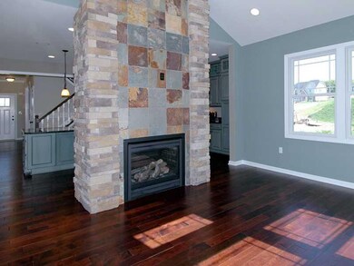 1st Floor Plan. 2 way fireplace is situated betwee