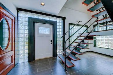 Entry Way to Stairs and Elevator