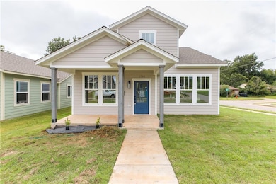 Fantastic corner lot location and charming curb ap