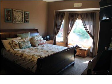 Master bedroom with large bay window, beautiful vi