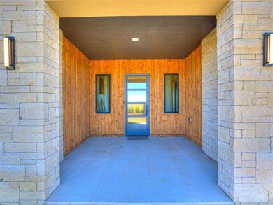 Dramatic stone and wood entryway.